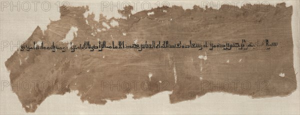 Fragment of a Tiraz, 934 - 940. Egypt, Ikhshidid period, Caliphate of al-Radi, AH 322-329 (A.D. 934-940). Tabby ground with inwoven tapestry inscription; linen and silk; overall: 16.9 x 44.2 cm (6 5/8 x 17 3/8 in.)