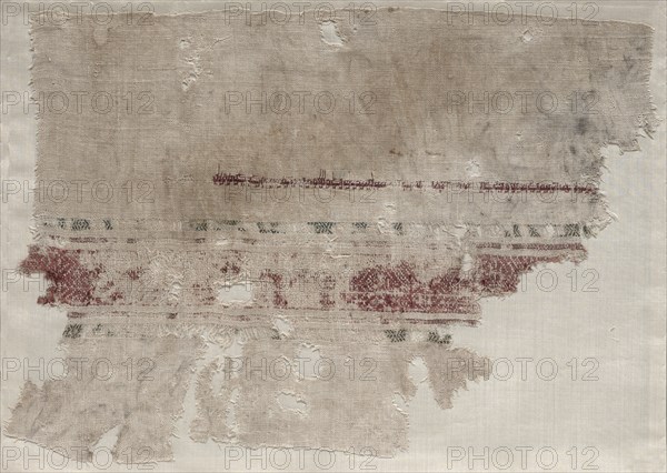Fragment of a Tiraz, 932 - 940. Egypt, Tunah, Ikhshidid period, Caliphate of al-Qahir or al-Radi, AH 320-329 (A.D. 932-940). Silk embroidery on linen tabby ground; overall: 33 x 46.4 cm (13 x 18 1/4 in.)