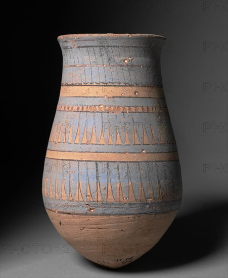 Blue-Painted Jar, 1353-1337 BC. Egypt, El-Amarna, house T.36.54. Excavations of the Egypt Exploration Society, 1930, New Kingdom, Dynasty 18, reign of Akhenaten, 1353-1337 BC. Nile silt ware; diameter of mouth: 10.4 cm (4 1/8 in.); overall: 23 cm (9 1/16 in.)