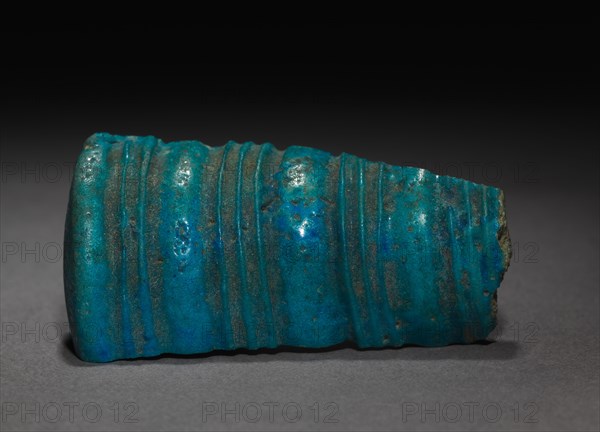 Fragment, 1353-1337 BC. Egypt, New Kingdom, Dynasty 18, reign of Akhenaten. Turquoise faience; overall: 3.4 x 1.2 cm (1 5/16 x 1/2 in.).