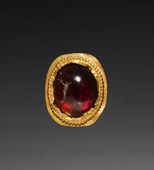 Garnet, 1-200. Parthian, 1st-2nd Century. Gold and garnet; overall: 0.3 x 0.8 x 0.9 cm (1/8 x 5/16 x 3/8 in.); with mount: 0.3 x 0.8 x 2.4 cm (1/8 x 5/16 x 15/16 in.).