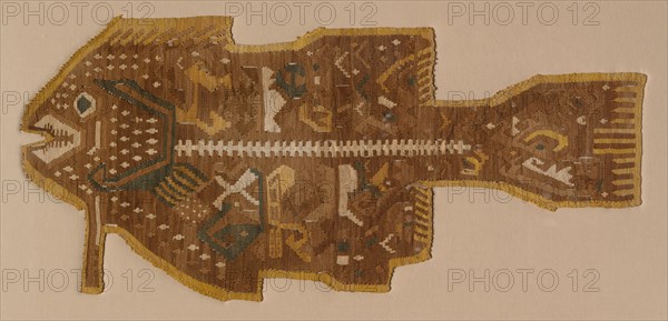 Fish-Shaped Applique, 1400-1532. Central Andes, Central Coast, Ychsma (Pachacamac) people. Cotton and camelid fiber, tapestry weave with areas of eccentric weft floats; average: 25.4 x 55.3 cm (10 x 21 3/4 in.)
