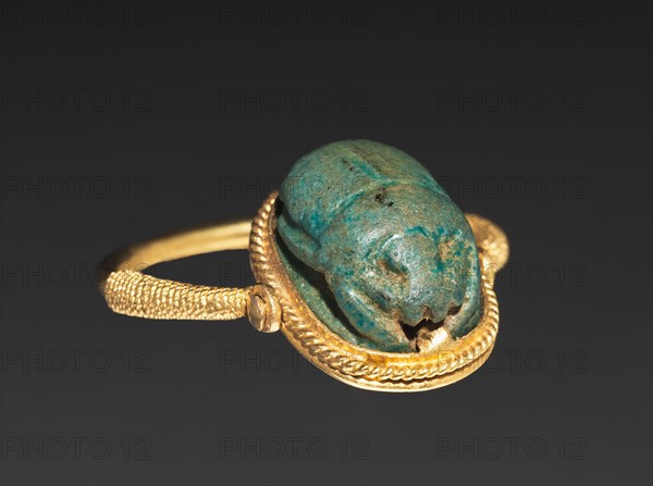 Scarab Ring, 1540-1069 BC. Egypt, New Kingdom. Turquoise faience (mounted on swivel bezel in modern gold ring); diameter: 2.2 cm (7/8 in.); diameter including bezel: 1.2 cm (1/2 in.).