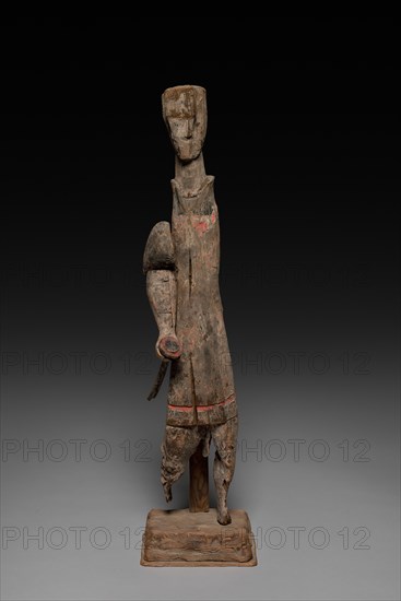Figure with Sword, 4th-3rd Century BC. China, Eastern Zhou dynasty (771-256 BC), Warring States period (475-221 BC). Wood with traces of polychromy; overall: 49.5 cm (19 1/2 in.).
