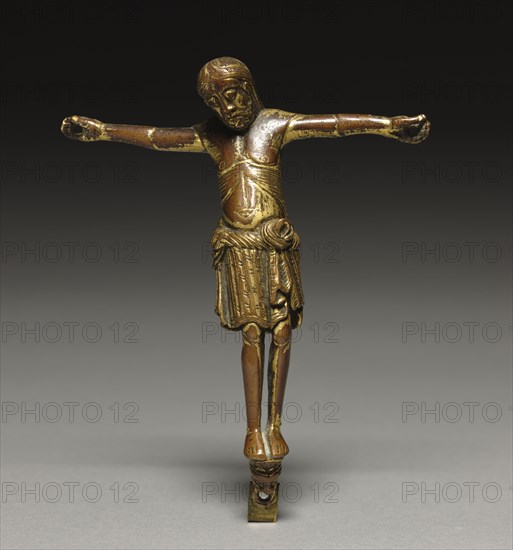 Crucified Christ, c. 1200. Germany, Rhine Valley, Romanesque  period,  early 13th century. Gilt bronze; overall: 14.6 x 12.4 cm (5 3/4 x 4 7/8 in.)