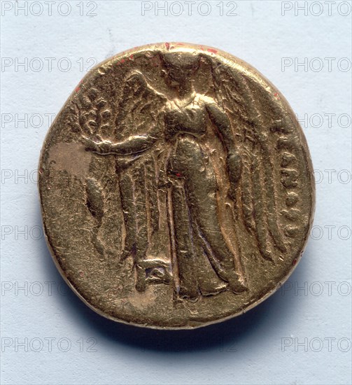Stater: Nike (reverse), 336-323 BC. Greece, Macedonia, reign of Alexander the Great (336-323 BC). Gold; diameter: 1.6 cm (5/8 in.).