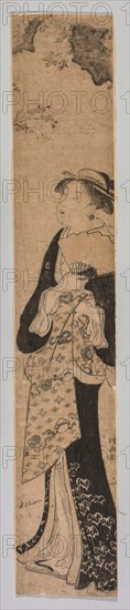 A Beauty in Spring, 1752-1815. After Torii Kiyonaga (Japanese, 1752-1815). Color woodblock print; sheet: 63.2 x 10.8 cm (24 7/8 x 4 1/4 in.).