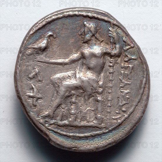 Tetradrachm:  Zeus Aetophoros Enthroned,  Holding Staff (reverse), 336-323 BC. Greece, Alexander period, 4th century BC. Silver; diameter: 2.6 cm (1 in.).