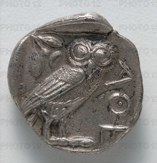 Tetradrachm:  Owl (reverse), 500-430 BC. Greece, Athens, 5th century BC. Silver; diameter: 2.4 cm (15/16 in.).