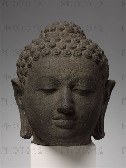 Head of Buddha, early 800s. Indonesia, Java, Borobudur, Sailendra Period, 9th Century. Volcanic stone; overall: 30.6 cm (12 1/16 in.).
