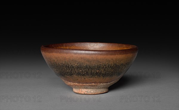 Tea Bowl: Jian ware, 960-1279. China, near Shui ch'i, Song dynasty (960-1279). Purplish brown stoneware with iron slip glaze coating; diameter: 9 cm (3 9/16 in.); overall: 4.6 cm (1 13/16 in.)