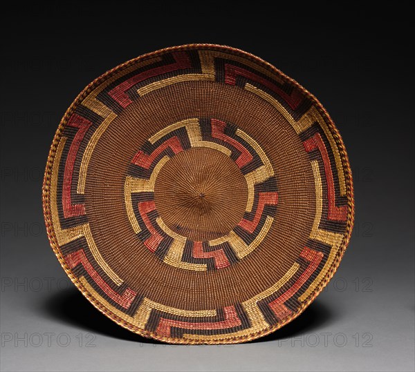 Tray, late 1800's. Northwest Coast, Tlingit, late 19th century. Spruce root, Beach grass; twined; overall: 6 x 24.5 cm (2 3/8 x 9 5/8 in.).