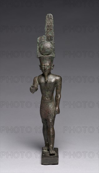 Statuette of Amen-Ra, 664-30 BC. Egypt, Late Period, Dynasty 26 or later. Bronze, solid cast, inlaid; overall: 25.8 x 5 x 7.3 cm (10 3/16 x 1 15/16 x 2 7/8 in.).