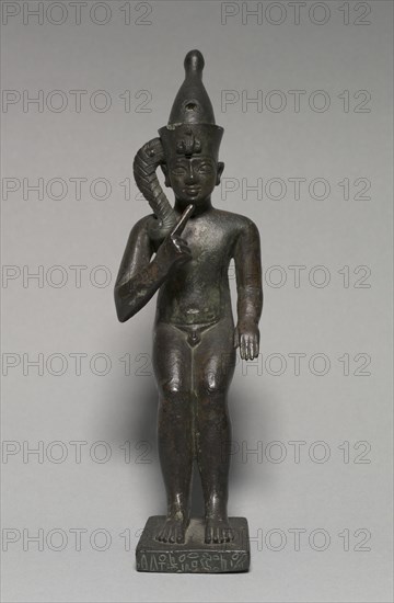 Statuette of Harpocrates, 304-30 BC. Egypt, Greco-Roman Period, Ptolemaic Dynasty. Bronze, solid cast; overall: 18.6 x 5.7 x 10.5 cm (7 5/16 x 2 1/4 x 4 1/8 in.).