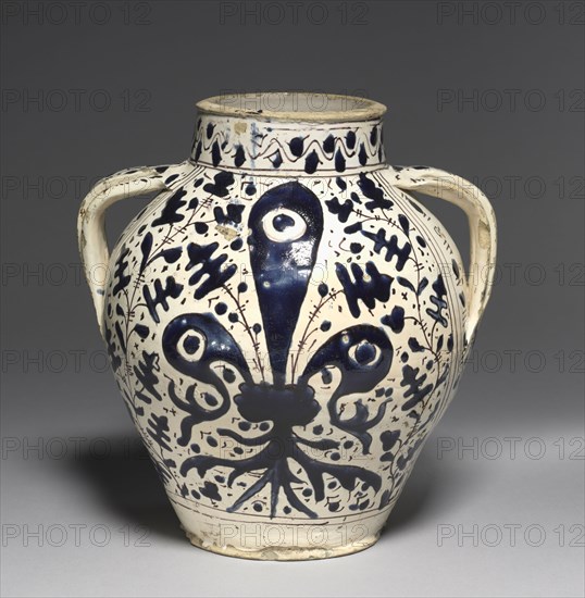 Two-Handled "Oak Leaf" Pharmacy Jar with Fleur-de-Lys, c. 1430-1450. Workshop of Giunta di Tugio (Italian, c. 1382-1450). Tin-glazed earthenware (maiolica); overall: 29.6 cm (11 5/8 in.)