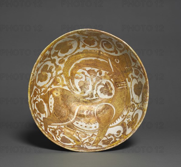 Luster Bowl with Ibex, 1000s. Egypt, Fustat (Old Cairo), Fatimid Period, 11th century. Earthenware with luster-painted design; overall: 9.6 x 24.7 cm (3 3/4 x 9 3/4 in.).