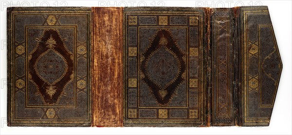 Bookbinding for a Koran, 1460-1500. Turkey, Istanbul, Ottoman period, 15th century. Leather over paper pasteboards; outer cover tooled, blue paint; inner covers openwork designs over colored papers; overall: 36 x 81.6 cm (14 3/16 x 32 1/8 in.).