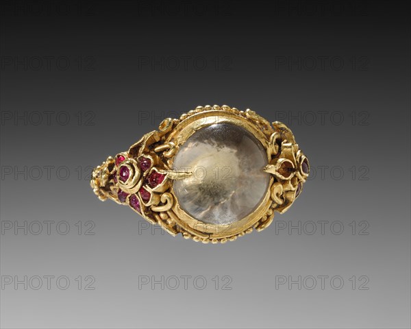 Ring, 1800s. Cambodia, 19th century. Gold with moonstone and rubies; diameter: 3 cm (1 3/16 in.).