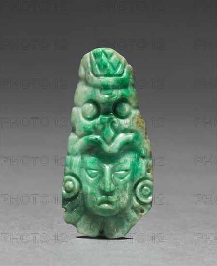 Head Ornament, c. 600-900. Honduras, Copan, Maya, 7th-10th Century. Jade; overall: 7.7 x 3.8 cm (3 1/16 x 1 1/2 in.).