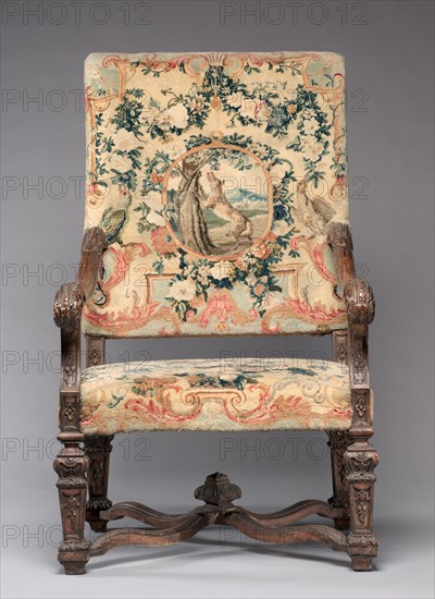 Chair, before 1717. Royal Savonnerie Manufactory, Chaillot Workshops (French, est. 1627). Carved wood, Savonnerie knotted-pile (symmertrical rug knot) upholstery; wool, hemp; overall: 121.9 x 70.5 x 55.3 cm (48 x 27 3/4 x 21 3/4 in.).