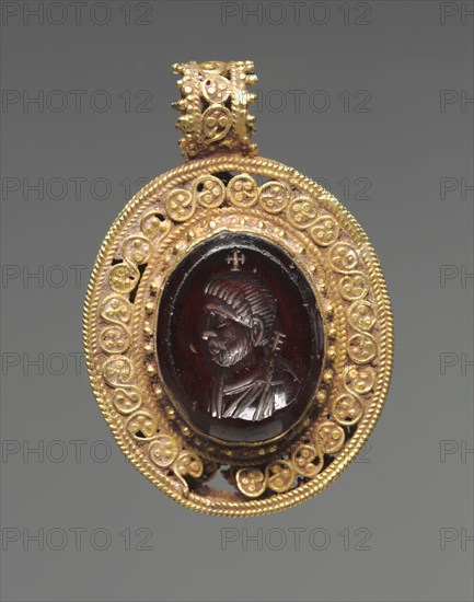 Pendant with Portrait Intaglio, 500s. Byzantium, early Byzantine period, 6th century. Garnet with gold filigree setting; overall: 3.4 x 2.3 cm (1 5/16 x 7/8 in.).