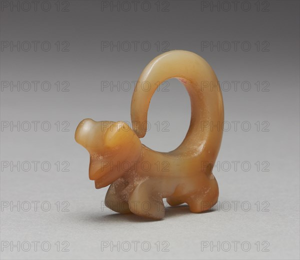 Curly-Tailed Animal Pendant, 100-800. Panama, Initial style, 2nd-8th century. Agate; overall: 5.2 x 3.1 cm (2 1/16 x 1 1/4 in.).