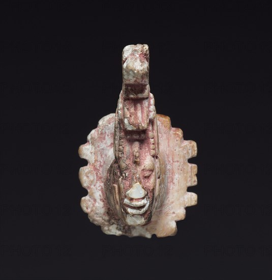 Ear Ornament, c. 600-900. Mexico or Central America, Maya, 7th-10th century. Carved shell; overall: 3.8 x 2.3 cm (1 1/2 x 7/8 in.).