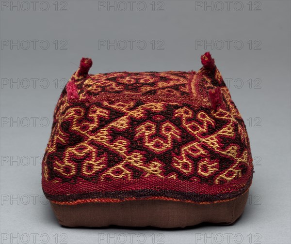 Four-Cornered Hat, c. 1400-1532. Peru, South Coast, Ica Valley, Inca Culture, 15th-16th century. Camelid fiber; overall: 7.5 x 14 x 14 cm (2 15/16 x 5 1/2 x 5 1/2 in.)