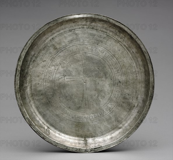 Paten (Dedicated to Saint Sergius) from the Beth Misona Treasure, c. 500. Early Byzantium, Constantinople or Syria, Byzantine period, 6th-7th Century. Silver; diameter: 32.2 x 3.5 cm (12 11/16 x 1 3/8 in.).