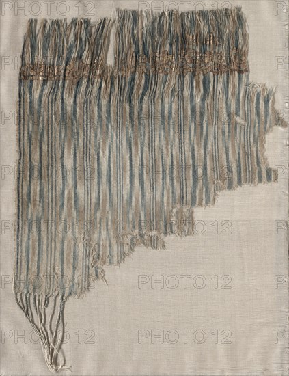 Fragment of a Tiraz, 10th century. Yemen, San'a', Reign of Rassid Imams, 10th century A.D. (second half of 4th c. AH). Ikat dyed tabby cloth with painted inscription; overall: 41.7 x 30 cm (16 7/16 x 11 13/16 in.).