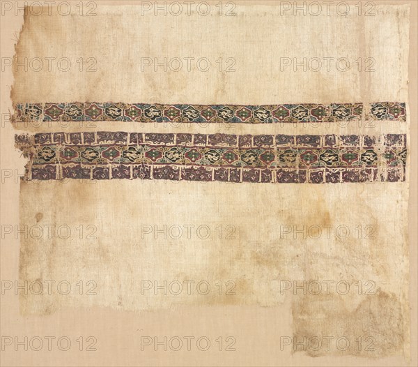 Fragmentary Band, Probably Part of a Clavus, 1073 - 1094. Egypt, Fatimid period, Caliphate of al-Mustansir, AH 466-487 (A.D. 1073-1094). Tabby ground with inwoven tapestry ornament; linen and silk; overall: 36.3 x 40 cm (14 5/16 x 15 3/4 in.)