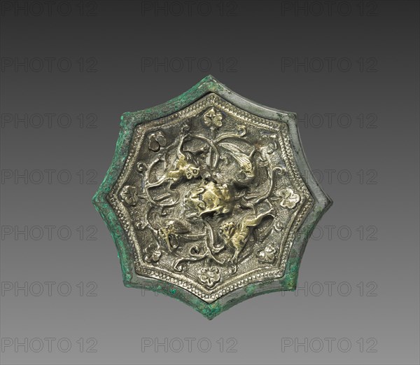 Mirror with Animals and Birds, early 700s. China, Tang dynasty (618-907). Bronze inset with gilded-silver relief decoration; diameter: 5.1 cm (2 in.).