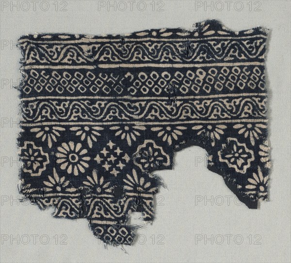 Fragment with decorated bands, probably 1400s. India, Gujarat. Plain weave: cotton, stamped resist and dyed; overall: 7.9 x 15.6 cm (3 1/8 x 6 1/8 in.)