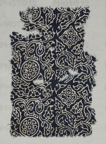 Fragment, 1400s (?). India, 15th century (?). Stamped resist, dyed; cotton; overall: 24.8 x 16.5 cm (9 3/4 x 6 1/2 in.)