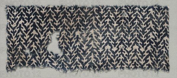 Fragment, 1100s - 1300s. India, 12th-14th century. Plain cloth, resist dyed; cotton; overall: 11.2 x 27 cm (4 7/16 x 10 5/8 in.).