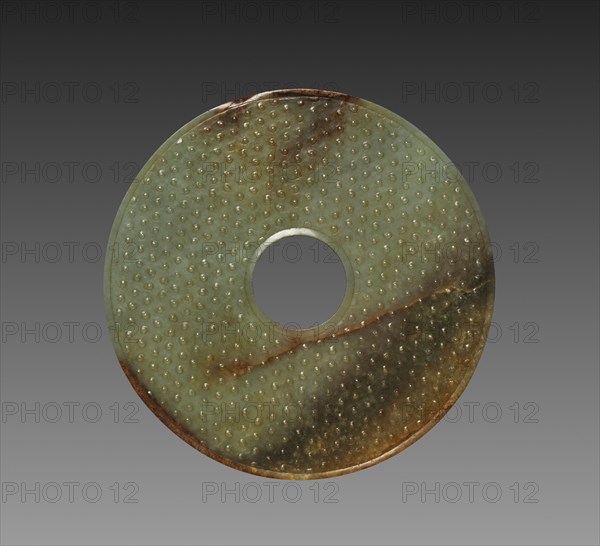 Ceremonial Disk with Grain Pattern (Bi), 475-221 BC. China, Warring States period (475-221 BC). Jade (nephrite); diameter: 18.4 cm (7 1/4 in.).