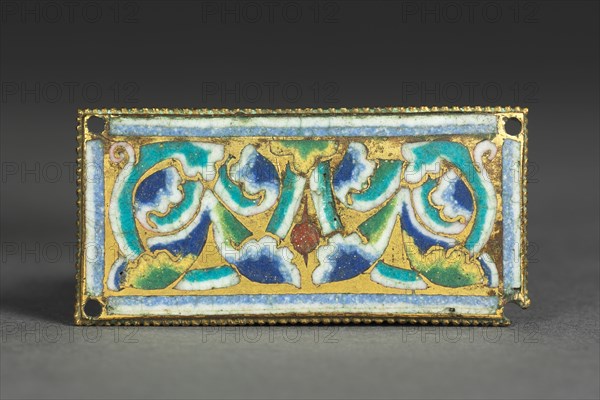 Plaque from a Reliquary Shrine, c. 1180-1190. Germany, Rhine Valley, Cologne, Romanesque period, 12th century. Gilded copper; champlevé and cloisonné enamel; overall: 3.2 x 6.6 cm (1 1/4 x 2 5/8 in.)