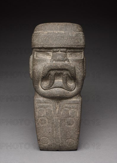 Celt with Deity, 1000-300 BC. Mexico, Olmec, 1200-300 BC. Stone; overall: 32.2 x 14 x 11.5 cm (12 11/16 x 5 1/2 x 4 1/2 in.).