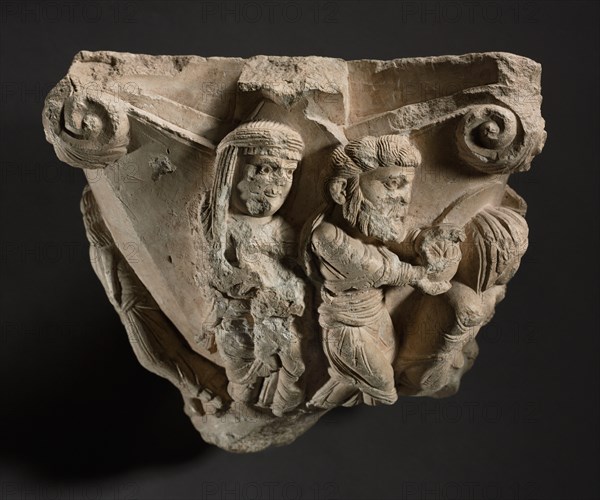 Fragment of a Capital with Scenes from Mary’s Infancy, early 1100s. Workshop of The Cathedral of Monopoli (Italian). Fine-grained limestone; without base: 26.7 x 33 x 22.9 cm (10 1/2 x 13 x 9 in.).
