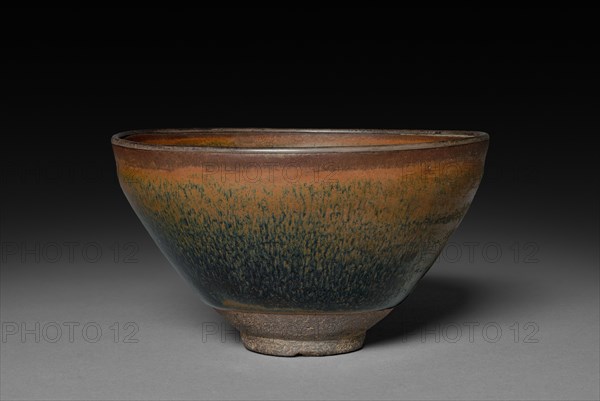Tea Bowl: Jian ware, 960- 1279. China, Fujian province, Song dynasty (960-1279). Purplish brown stoneware with iron slip glaze coating; diameter: 12.4 cm (4 7/8 in.); overall: 7 cm (2 3/4 in.).