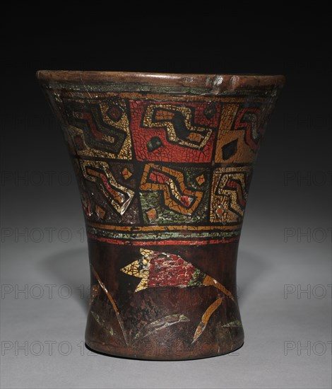 Kero (Waisted Cup), after 1550. Peru, Colonial Inka style, 16th century. Wood, inlaid pigments; diameter of mouth: 17.8 x 16 cm (7 x 6 5/16 in.); overall: 17.8 cm (7 in.).