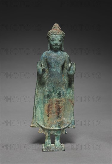 Buddha with Hands in Gesture of Teaching, Vitarka Mudra, 600s. Thailand, Mon-Dvaravati Period, 7th Century. Bronze; overall: 21 cm (8 1/4 in.).