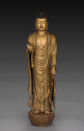 Buddha of Infinite Life and Light (Amida Nyorai), 1269. Koshun (Japanese), assistant Koshin (Japanese), assistant Joshun (Japanese). Cypress wood with lacquer, color, gold, cut gold, rock crystal inlaid eyes, and quartz; overall: 94.6 cm (37 1/4 in.).