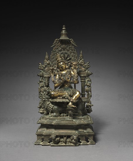 Bodhisattva  Manjushri: Lord of Wisdom, 1000s-1100s. East India, Bengal, Pala period, 11th-12th century. Image of gilded copper, pedestal and mandorla of brass; overall: 31.2 cm (12 5/16 in.); part 1: 6.5 x 15.5 x 11.9 cm (2 9/16 x 6 1/8 x 4 11/16 in.); part 2: 41.9 x 15.2 cm (16 1/2 x 6 in.); part 3: 16.5 x 8.5 cm (6 1/2 x 3 3/8 in.).