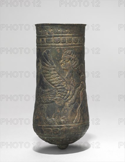Button-Based Situla, 900-700 BC. Iran, Luristan, 9th-7th Century BC. Bronze, repoussé, punched, incised; diameter: 5.9 cm (2 5/16 in.); overall: 13 cm (5 1/8 in.).