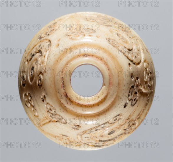 Spindle Whorl, 700s - 900s. Iran, early Islamic period, 8th - 10th century. Bone, incised; overall: 1.3 x 1.7 x 1.7 cm (1/2 x 11/16 x 11/16 in.)