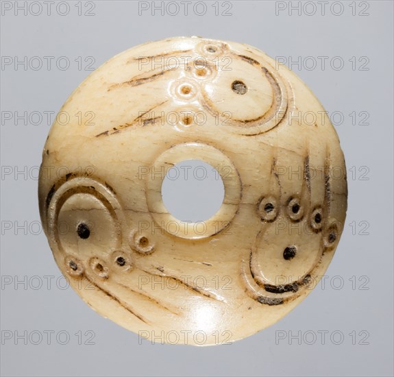 Spindle Whorl, 700s - 900s. Iran, early Islamic period, 8th - 10th century. Bone, incised; overall: 0.7 x 2.1 x 2.1 cm (1/4 x 13/16 x 13/16 in.)