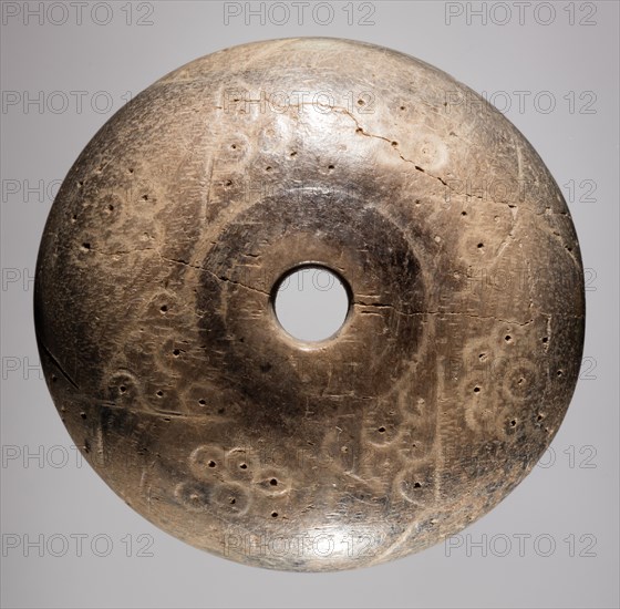 Spindle Whorl, 700s - 900s. Iran, early Islamic period, 8th - 10th century. Bone, incised; overall: 1 x 3.8 x 3.8 cm (3/8 x 1 1/2 x 1 1/2 in.)