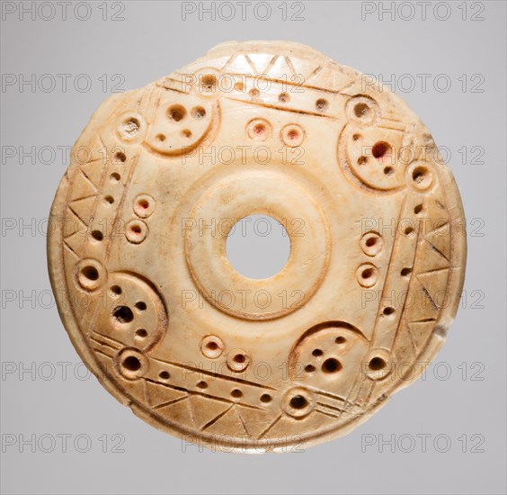 Spindle Whorl, 700s - 900s. Iran, early Islamic period, 8th - 10th century. Bone, incised; overall: 0.5 x 2.8 x 2.8 cm (3/16 x 1 1/8 x 1 1/8 in.)