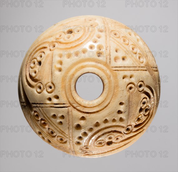 Spindle Whorl, 700s - 900s. Iran, early Islamic period, 8th - 10th century. Bone, incised; overall: 1 x 2.4 x 2.4 cm (3/8 x 15/16 x 15/16 in.)